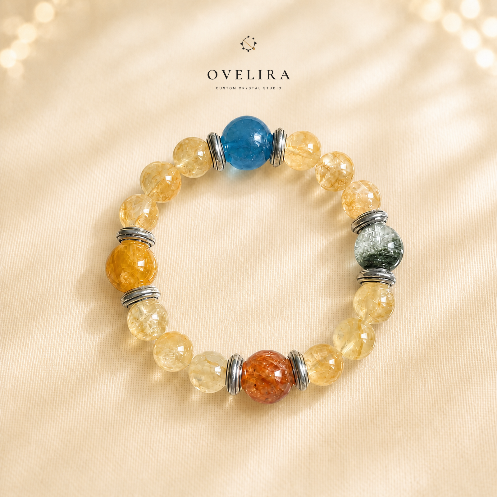 Sunlit Compass crystal bracelet on a warm ivory OVELIRA background